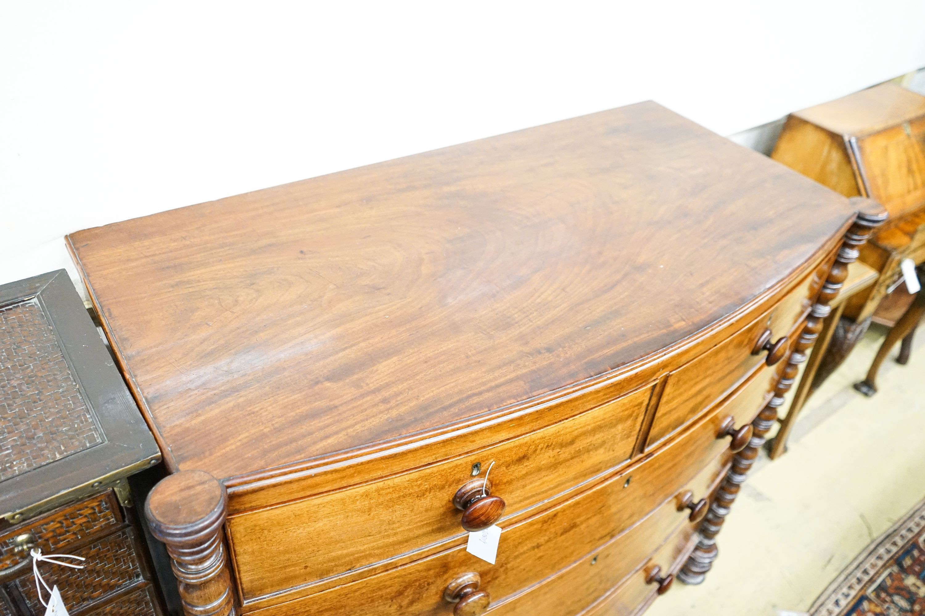 A Regency mahogany bowfront chest of drawers, width 112cm, depth 53cm, height 104cm